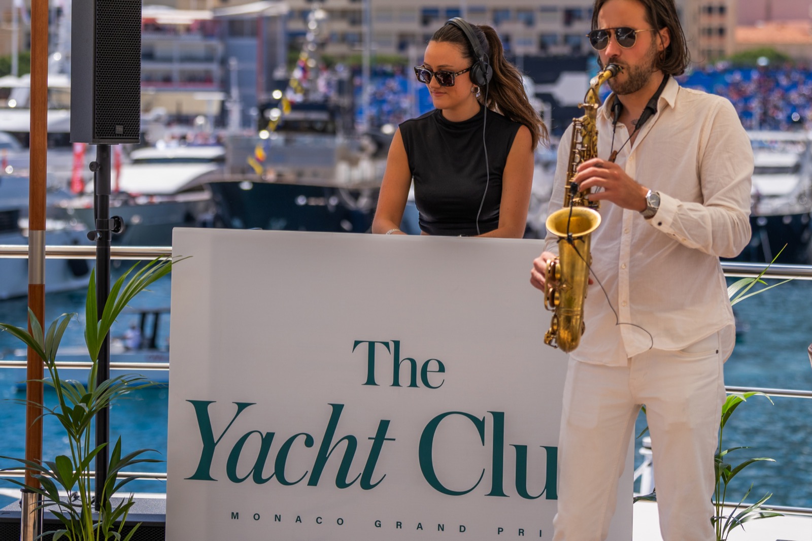 Live musicians performing by the water in Monaco